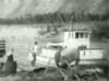 Le Yukon Rose s'en va à Ross River avec une barge remplie de provisions. (48 sec.)