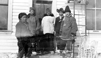 The McPherson RCMP Patrol which traveled from Dawson to McPherson and back again. Left to right: guide Peter Semple, Constable Pasley, Staff Sergeant Dempster, guide Jimmy Simon, and Constable Tyack. March, 1920