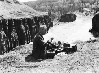 “Having my lunch at the famous Miles Canyon near Whitehorse”, 1943.