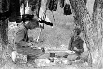 “Too busy to see the joke (or too English).” Claude and Mary picnicking near Ross River. August 1928