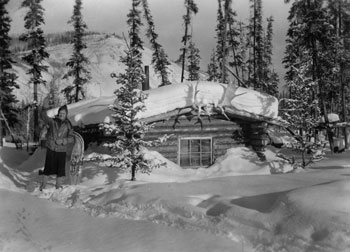 Mary at the cabin at Twelve Mile. ca. 1938
