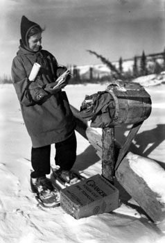 “Our friends don't forget us” Mary at the mail box at Twelve Mile, ca.1938-39.
