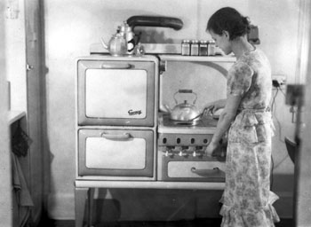 “No shavin's needed to make this fire.” Mary enjoys the luxury of a gas stove in their Vancouver apartment. 