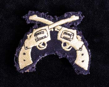 Pistol badge.