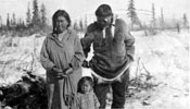Inuit couple with their child. Claude refers to the man as “Husky Charlie.”
